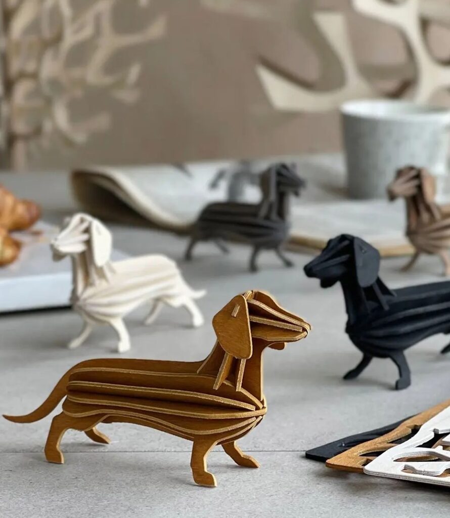 Lovi-Dachshund-all-colors-on-coffee-table